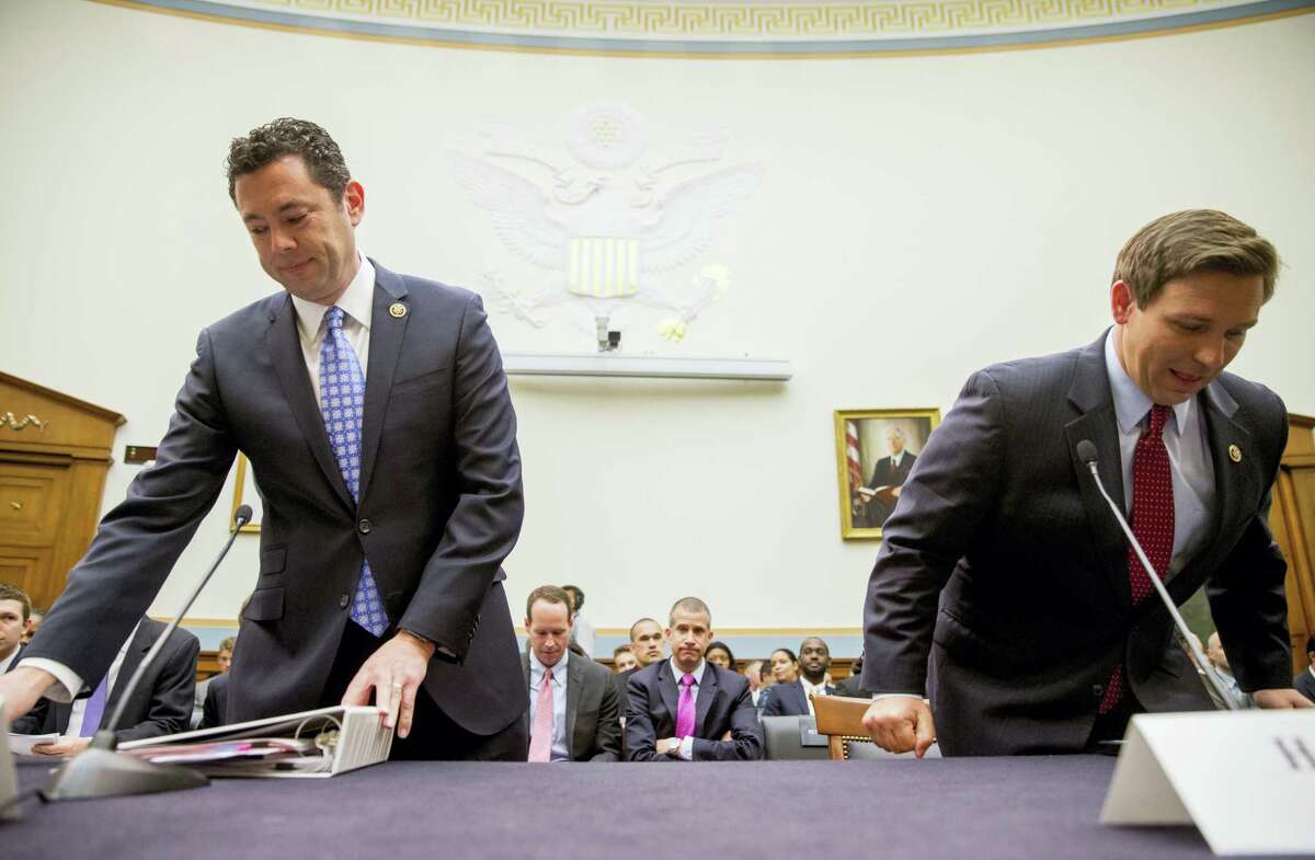 U.S. Reps. Jason Chaffetz, R-Utah, left, and Ron DeSantis, R-Fla., arrive to testify at a House Judiciary Committee hearing, Tuesday, May 24, 2016, in Washington, on allegations of misconduct against IRS Commissioner John Koskinen.