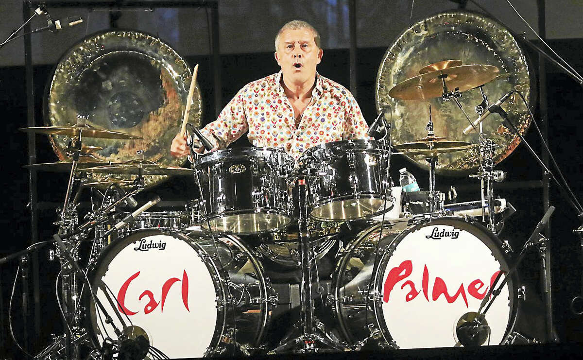 Photo by John AtashianDrummer and percussionist Carl Palmer performs during his tribute concert to keyboard player Keith Emerson at the Infinity Music Hall in Hartford on Nov. 13. He is credited as one of the most respected rock drummers to emerge from the 1960s. In addition, Palmer is a veteran of a number of famous bands, including “The Crazy World of Arthur Brown”, “Atomic Rooster”, “Emerson, Lake & Palmer” and “Asia”. Carl was inducted into the Modern Drummer Hall of Fame in 1989. To learn more about upcoming entertainment coming to the Infinity Music Hall you can visit www.infinityhall.com