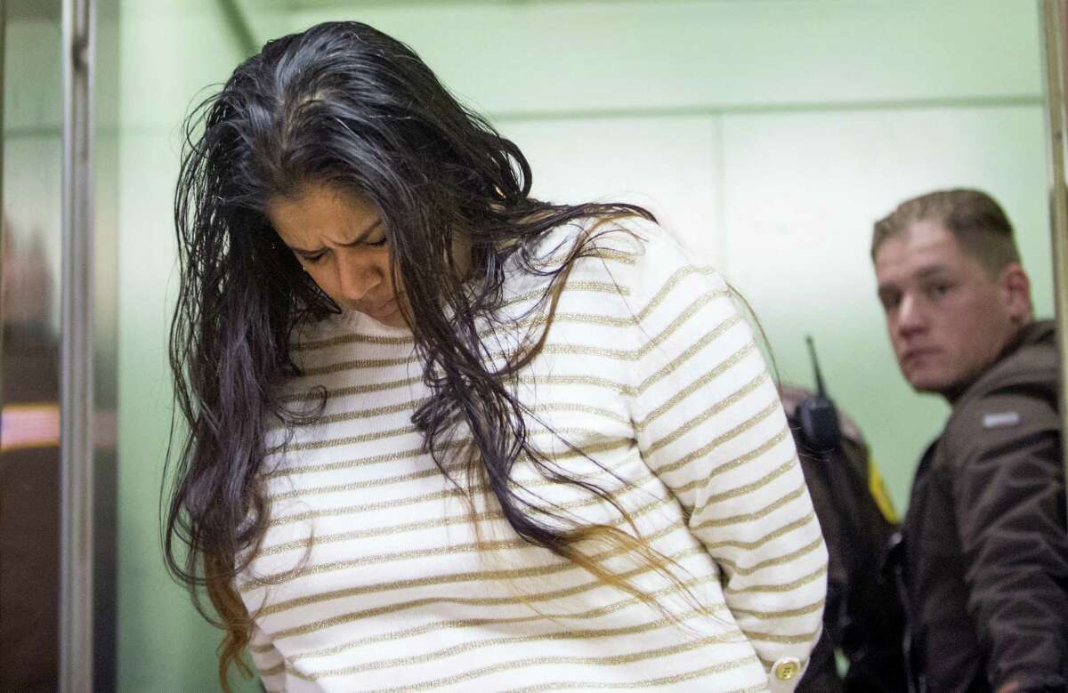In this March 30, 2015 photo, Purvi Patel is taken into custody after being sentenced to 20 years in prison for feticide and neglect of a dependent on at the St. Joseph County Courthouse in South Bend, Ind.