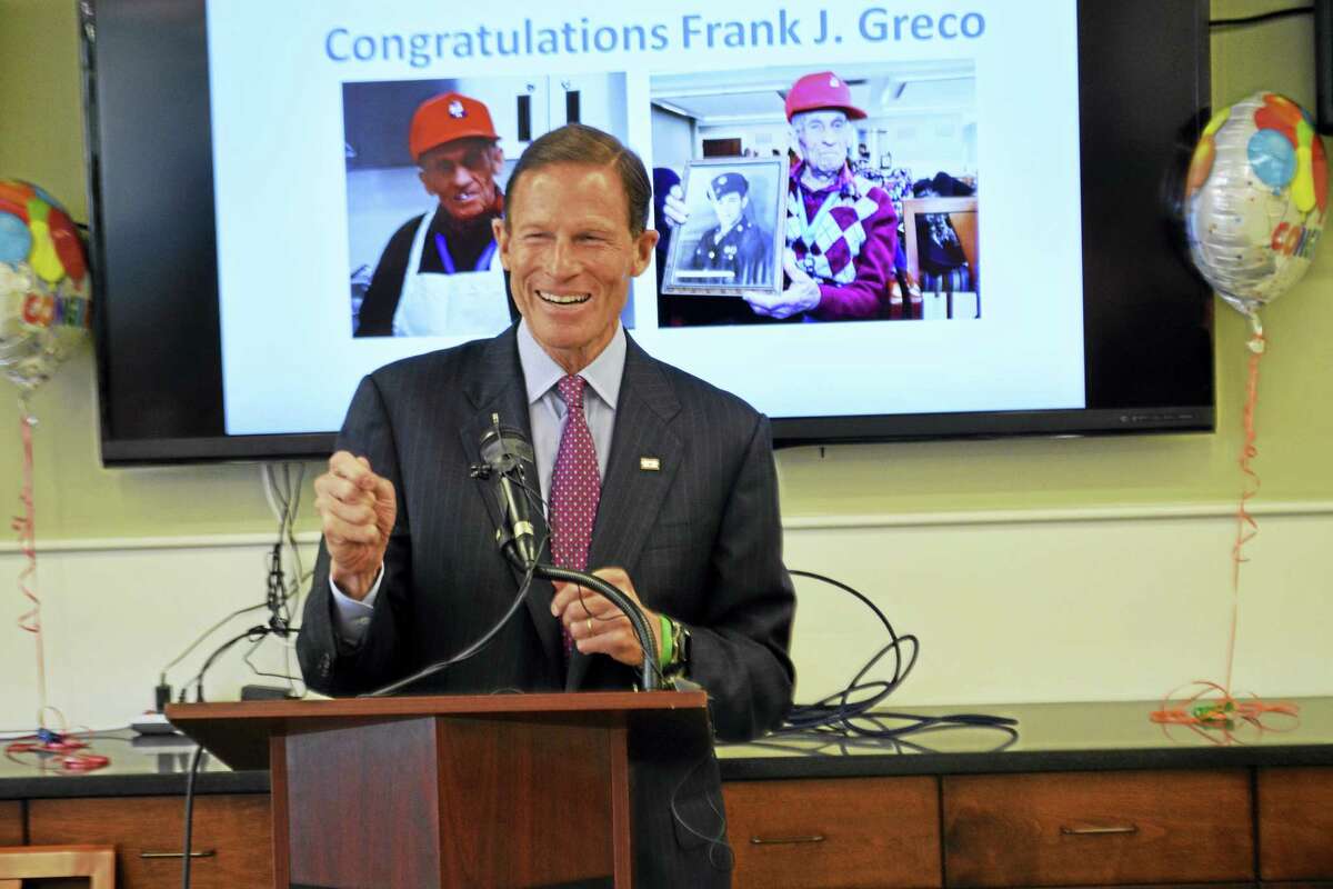 U.S. Sen. Richard Blumenthal speaks Friday during a visit to the Middletown Senior Center to congratulate WWII veteran Frank Greco on his 92nd birthday and announce a bipartisan bill that aims to reduce crimes against seniors.