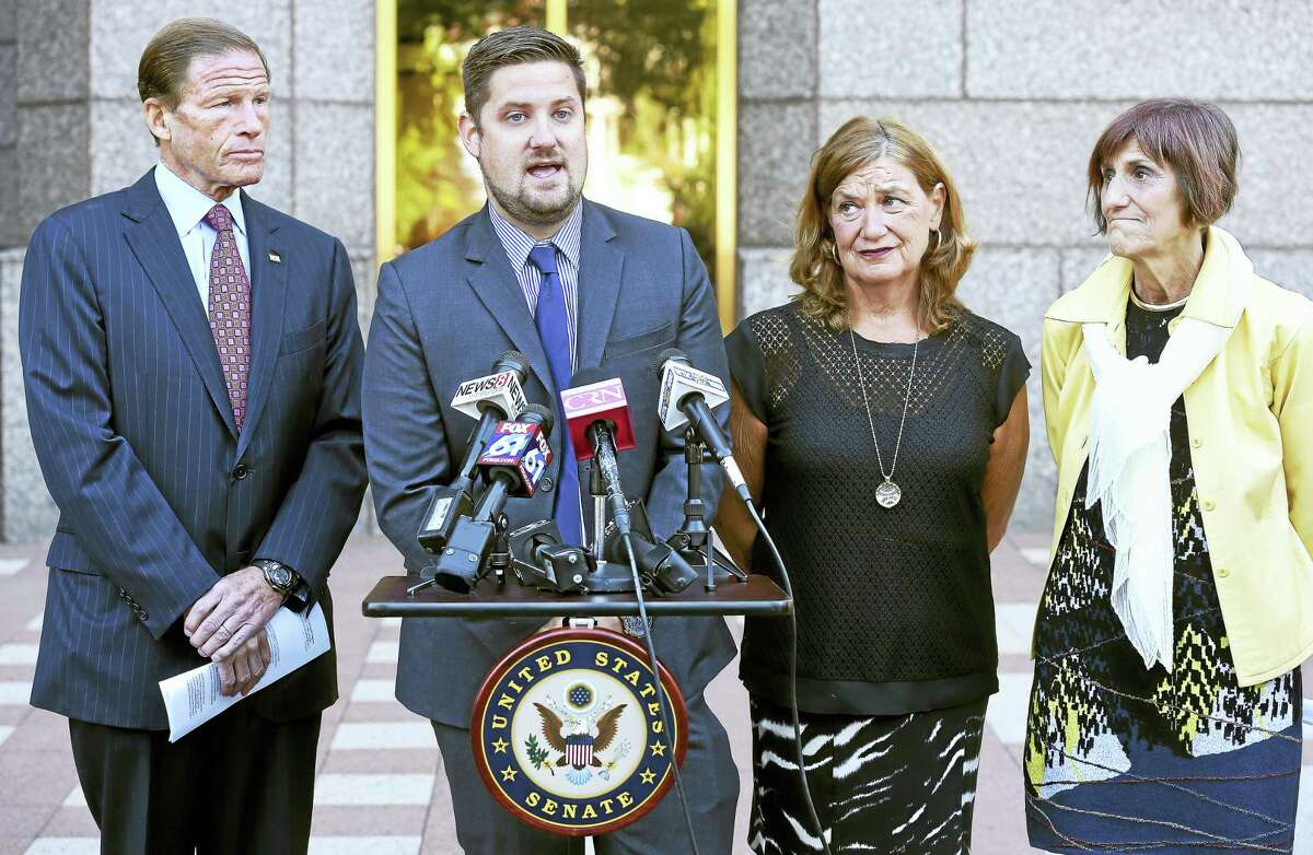 U.S. Sen. Richard Blumenthal, left, and U.S. Rep. Rosa DeLauro, right, joined Brett Eagleson, center left, and his mother, Gail Eagleson, center right), at a press conference in New Haven on Sept. 12 to advocate for President Obama to sign the Justice for Victims of Terorism Act.