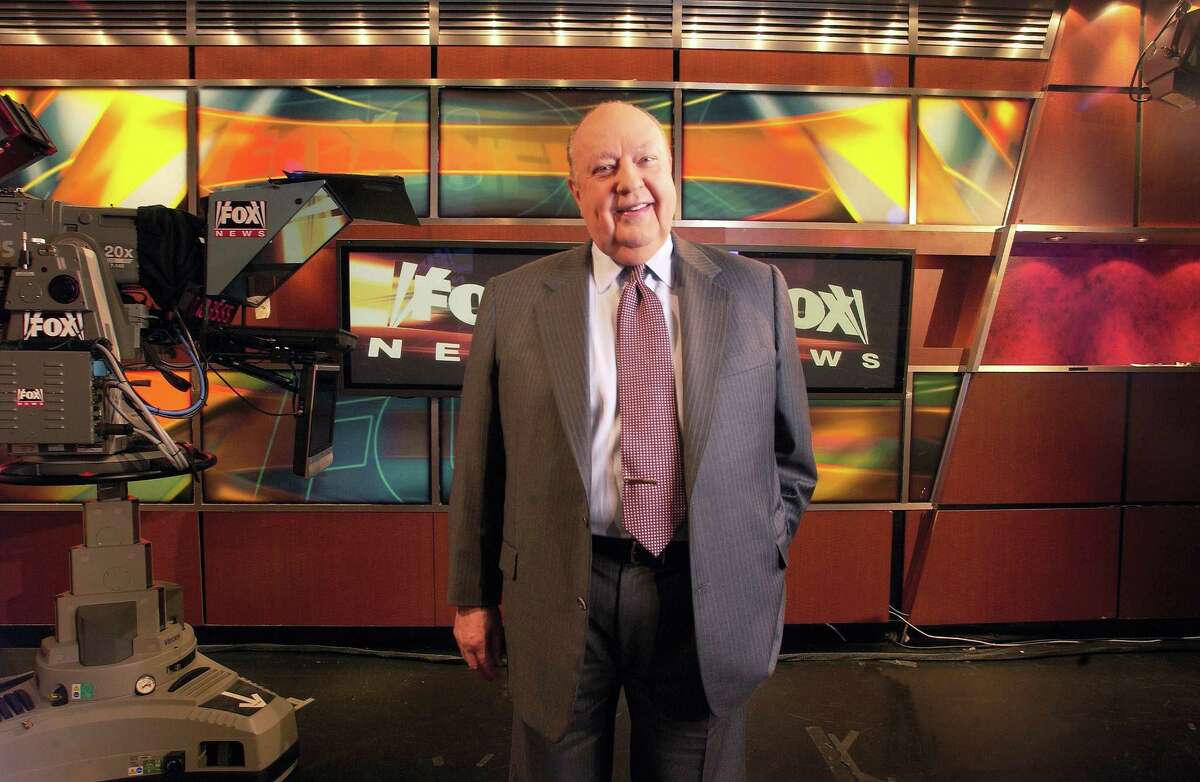 Fox News CEO Roger Ailes poses at Fox News in New York. 21st Century Fox says Ailes is resigning. The announcement comes amid charges by former anchor Gretchen Carlson, who claims she was fired after refusing his sexual advances.