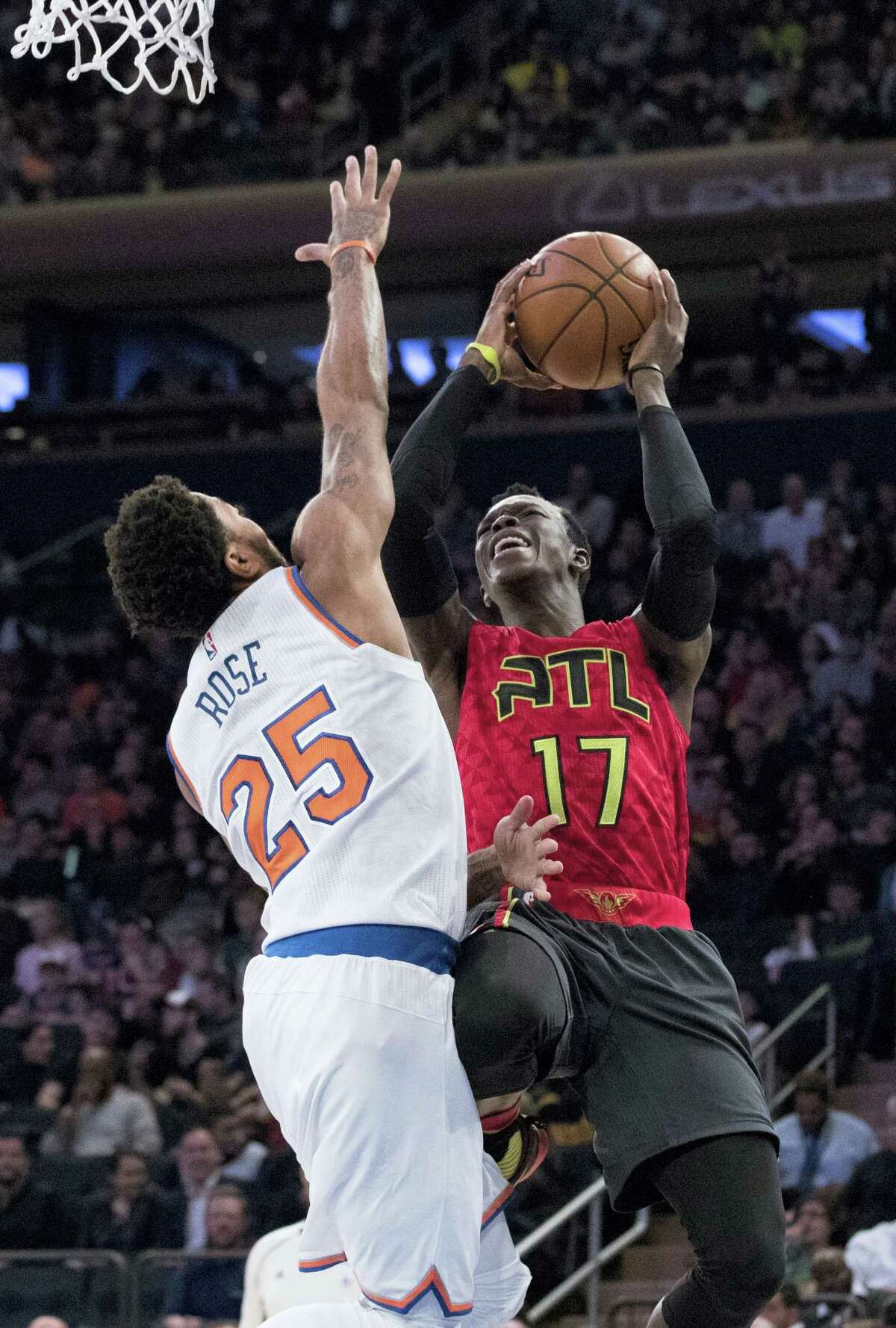 Atlanta Hawks guard Dennis Schroder (17) goes to the basket against New York Knicks guard Derrick Rose (25) during the second half of an NBA basketball game, Sunday, Nov. 20, 2016, at Madison Square Garden in New York. The Knicks won 104-94. (AP Photo/Mary Altaffer)