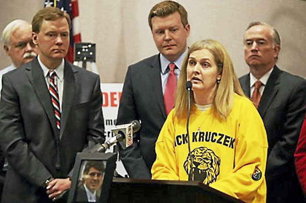 Guilford parent Sue Kruczek talks about her son Nick’s addiction to pain killers at a press conference Monday, March 21, 2016.