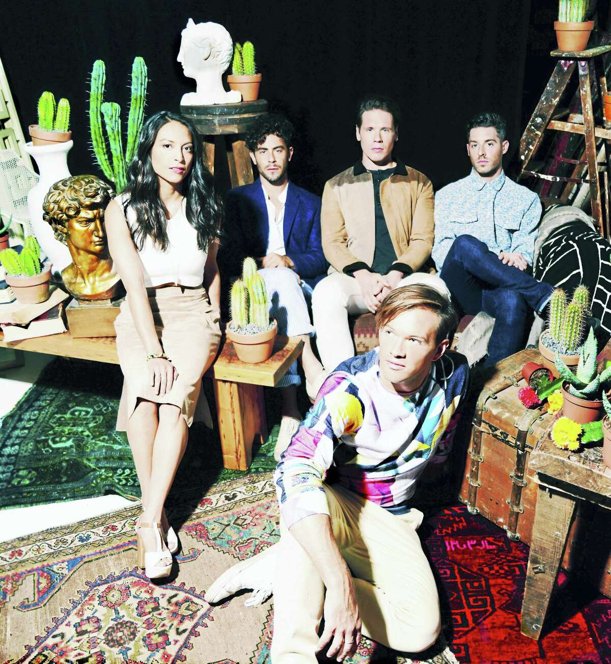 Jean-Philip Grobler, front, and the band St. Lucia.
