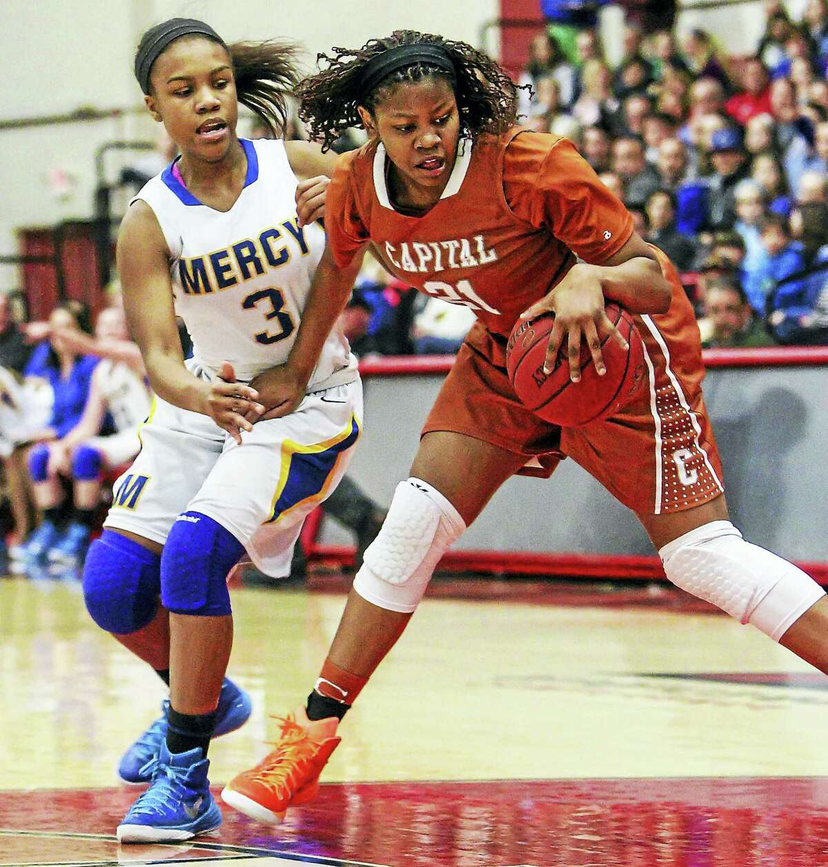 Mercy’s Destine Perry goes up against Capital Prep’s Desiree Elmore during last year’s mega-clash.