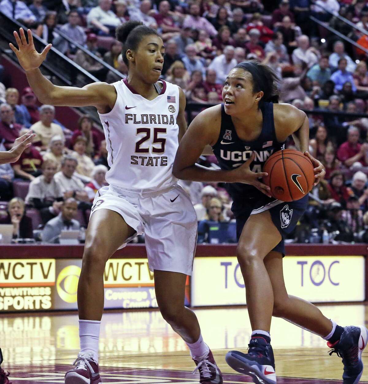 UConn’s Napheesa Collier drives to the basket against Florida State earlier this season.