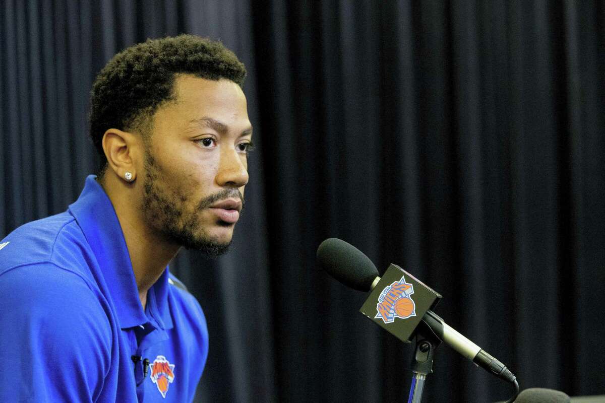 In this June 24, 2016 photo, Derrick Rose speaks during a news conference for the New York Knicks to announce they acquired him from the Chicago Bulls at Madison Square Garden in New York. A Los Angeles federal judge ruled Sept. 20, 2016 that a woman accusing NBA star Rose of rape cannot remain anonymous at her upcoming civil trial.