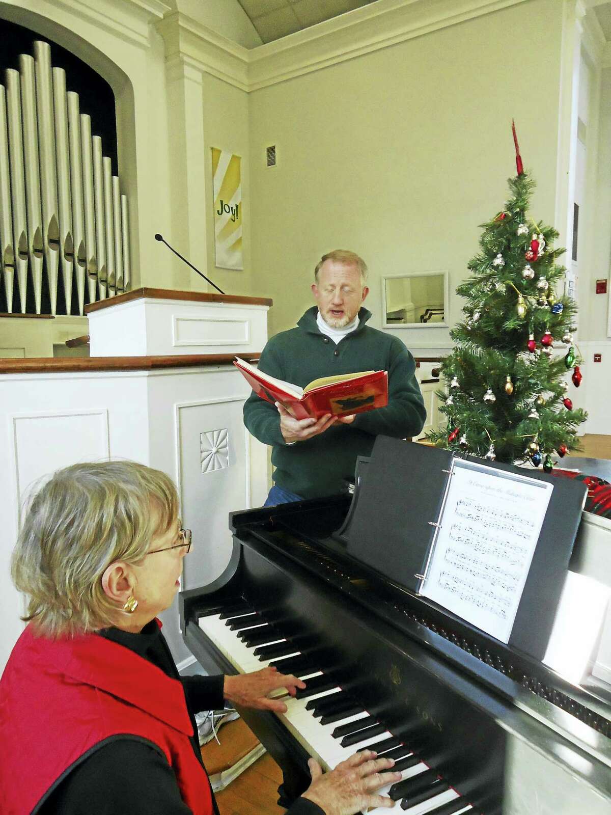 Accompanying photograph:A Christmas Soiree! Rev. Kenneth Peterkin, Pastor of The First Congregational Church in Essex and Essex resident Marian Messek on piano will perform holiday music and lead a carol sing at the Church's Christmas Soiree on December 9 at 5:30 p.m. The evening also features wine and hors d'oeuvres. Admission is $12 per person. Proceeds from the event benefit the missions of the Church. For more information, call (860) 767-8097 or visit www.essexucc.org.