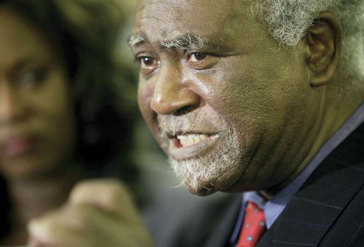 In this Nov. 9, 2009, file photo, U.S. Rep. Danny Davis, D-Ill. announces that he will run for re-election to this 7th congressional seat in Chicago. The grandson of Davis was fatally shot during a home invasion in Chicago, the Democratic congressman and police said. Jovan Wilson, 15, died Friday, Nov. 18, 2016, at the scene in the Englewood neighborhood on the city’Äôs South Side, Officer Michelle Tannehill said.