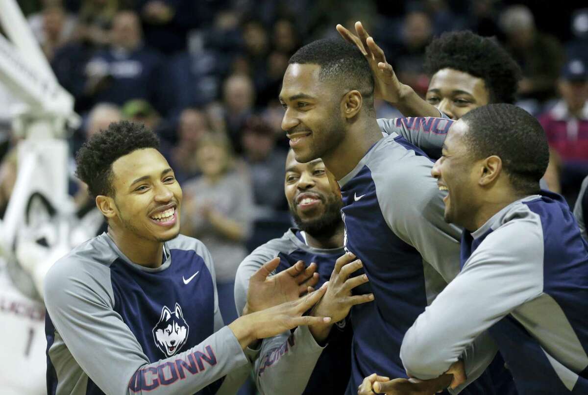 UConn’s Phil Nolan, center, has made defense his calling card in his time with the Huskies.
