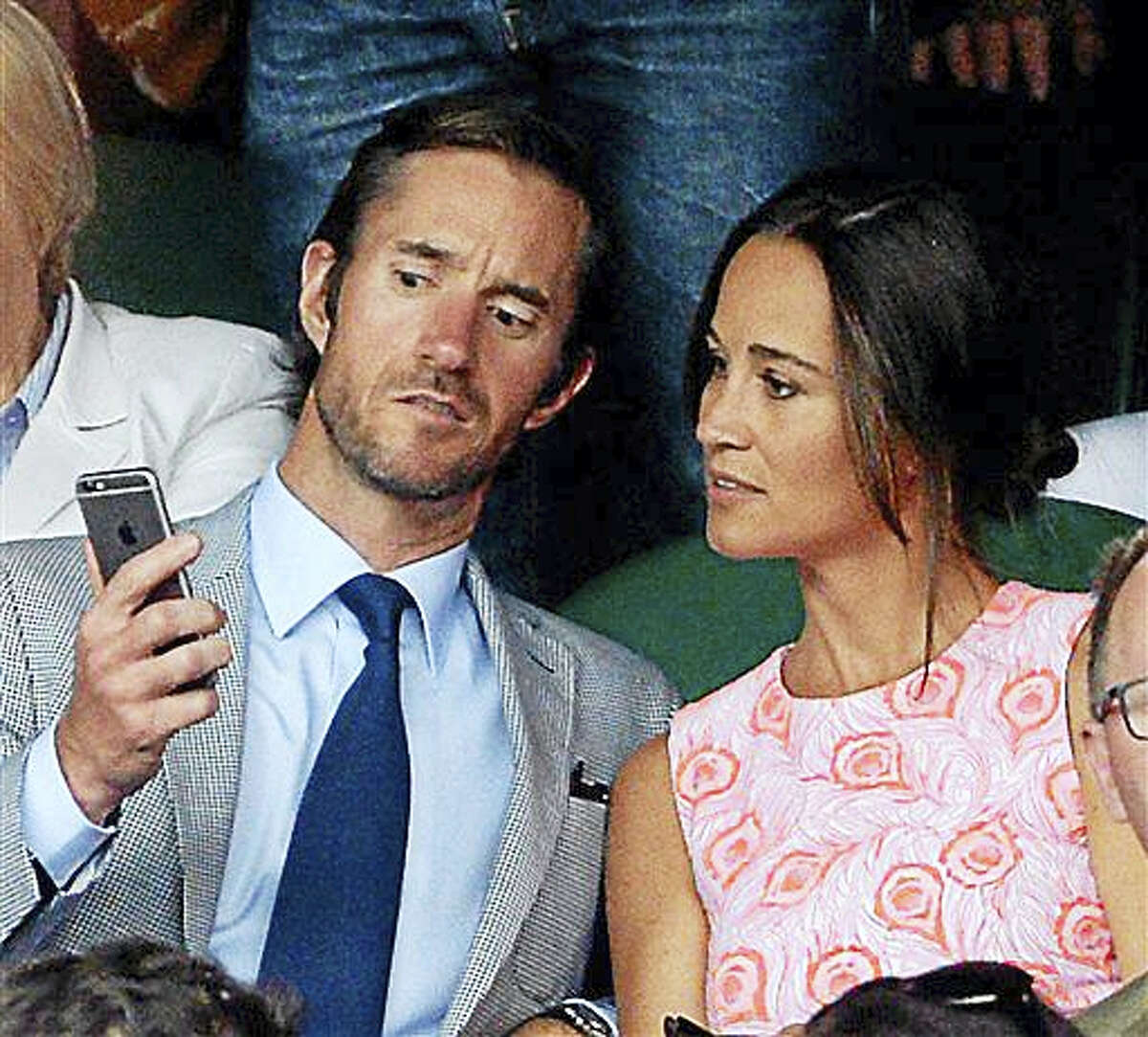 This is a July 6, 2016, file photo of Pippa Middleton and James Matthews on day nine of the Wimbledon Championships at the All England Lawn Tennis and Croquet Club, Wimbledon London. Pippa Middleton and fund manager James Matthews on Tuesday July 19, 2016 announced their engagement.