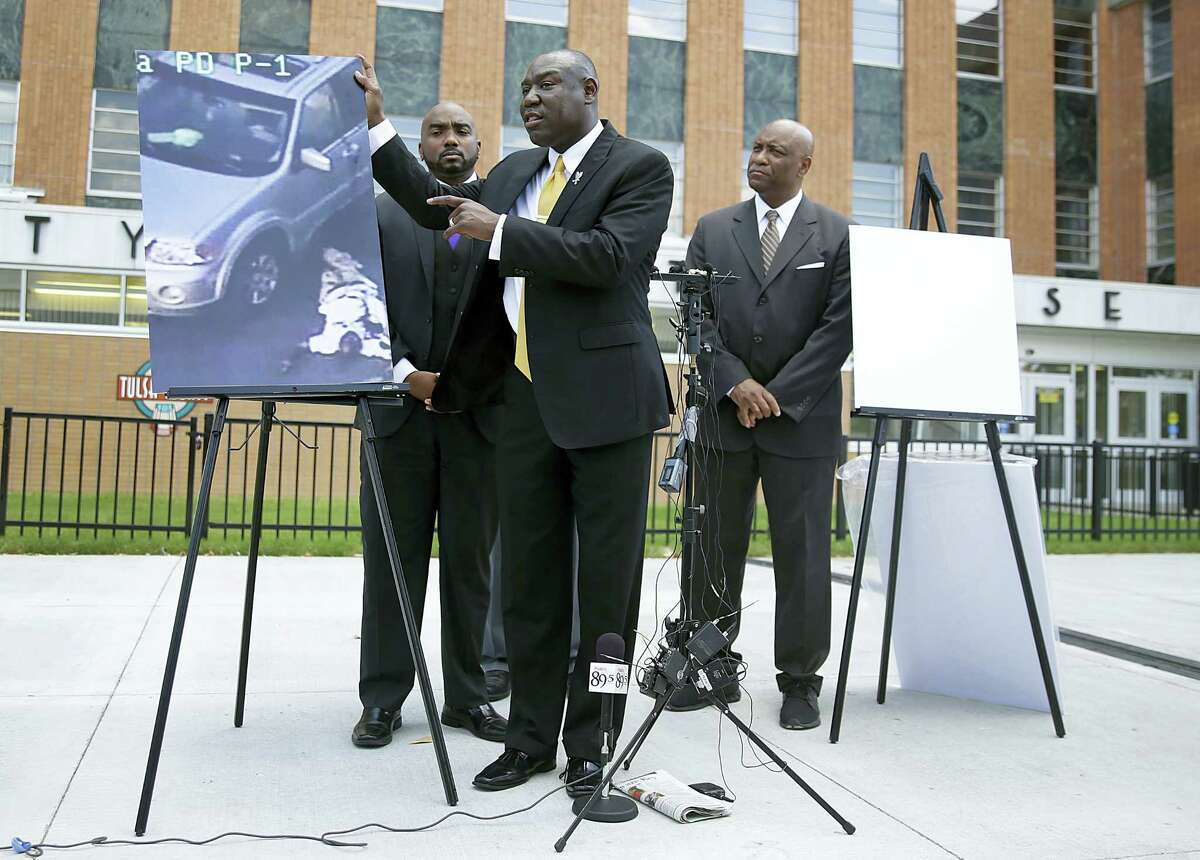 Attorney Benjamin Crump, center, one of the attorneys for Crutcher’s family, speaks about Terence Crutcher during a news conference on Sept. 20, 2016 in Tulsa, Okla. Also pictured are attorneys David Riggs, left, Damario Solomon-Simmons and Melvin C. Hall.