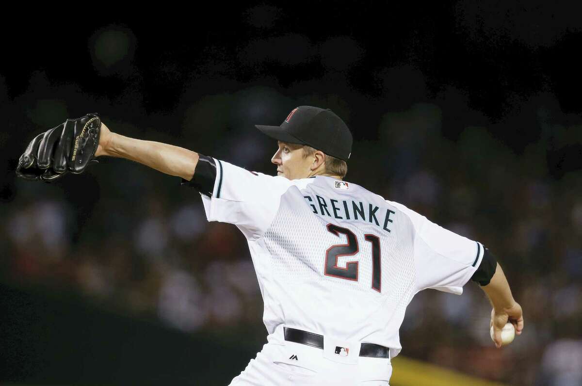 Arizona Diamondbacks' Zack Greinke throws a pitch against the New York Yankees during the seventh inning of a baseball game Tuesday, May 17, 2016, in Phoenix. The Diamondbacks defeated the Yankees 5-3. (AP Photo/Ross D. Franklin)