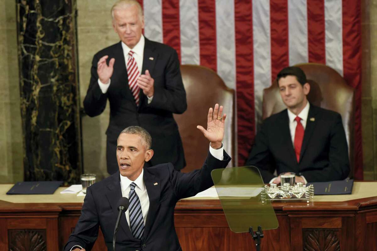 ASSOCIATED PRESS President Barack Obama waves goodbye after giving his final State of the Union address before a joint session of Congress on Capitol Hill in Washington, Tuesday. Vice President Joe Biden applauds; House Speaker Paul Ryan of Wisconsin is at right.