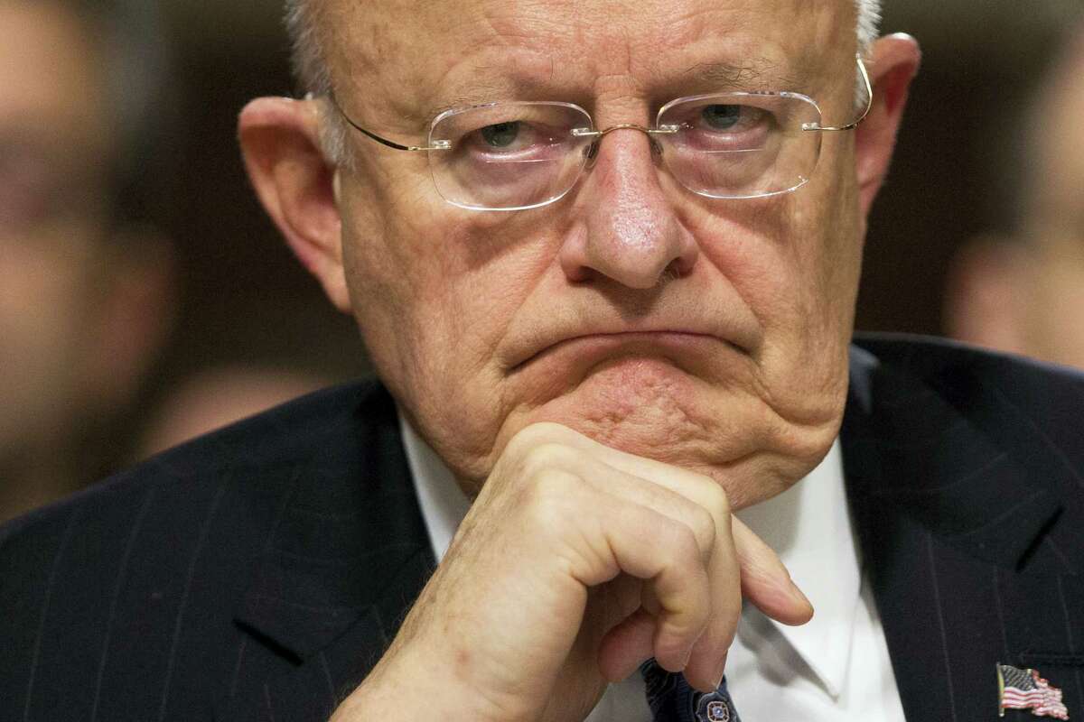 In this Feb. 9, 2016 file photo, Director of National Intelligence James Clapper listens on Capitol Hill in Washington. Clapper has resigned as DNI director.