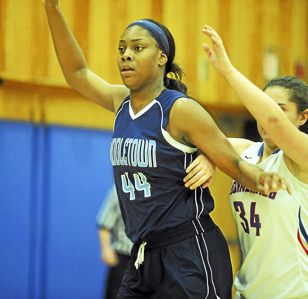 Middletown junior center Brielle Wilborn looks for the ball in the low post in the Blue Dragons’ recent non-league contest against Cogicnhaug in Durham.