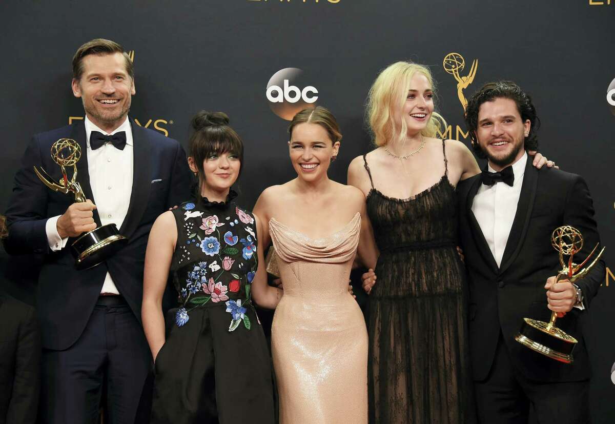 Nikolaj Coster-Waldau, from left, Maisie Williams, Emilia Clarke, Sophie Turner, and Kit Harington winners of the award for outstanding drama series for “Game of Thrones” pose in the press room at the 68th Primetime Emmy Awards on Sunday, Sept. 18, 2016, at the Microsoft Theater in Los Angeles.