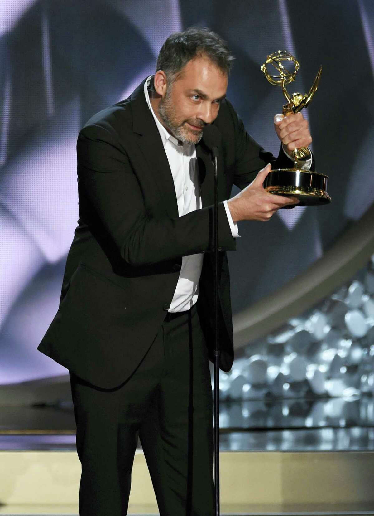 Miguel Sapochnik accepts the award for outstanding directing for a drama series for “Game of Thrones” at the 68th Primetime Emmy Awards on Sunday, Sept. 18, 2016, at the Microsoft Theater in Los Angeles.