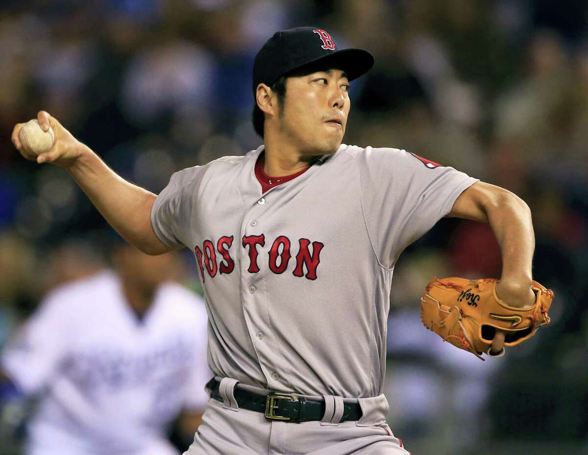 Koji Uehara delivers a pitch in the eighth inning on Tuesday.