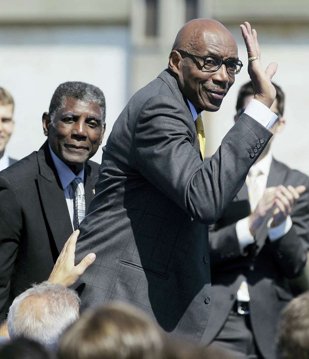Golden State Warriors great Nate Thurmond waves during an announcement in San Francisco in 2012.