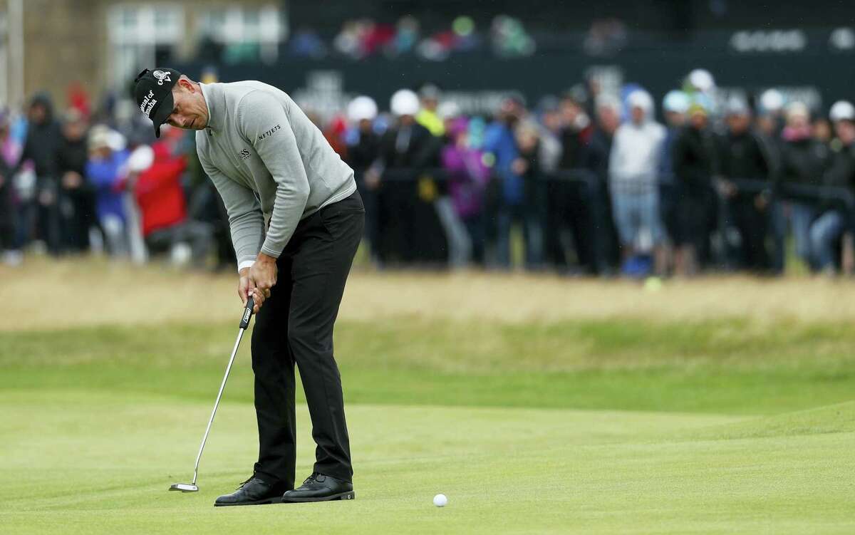 Henrik Stenson puts on the first green during the third round of the British Open on Saturday.