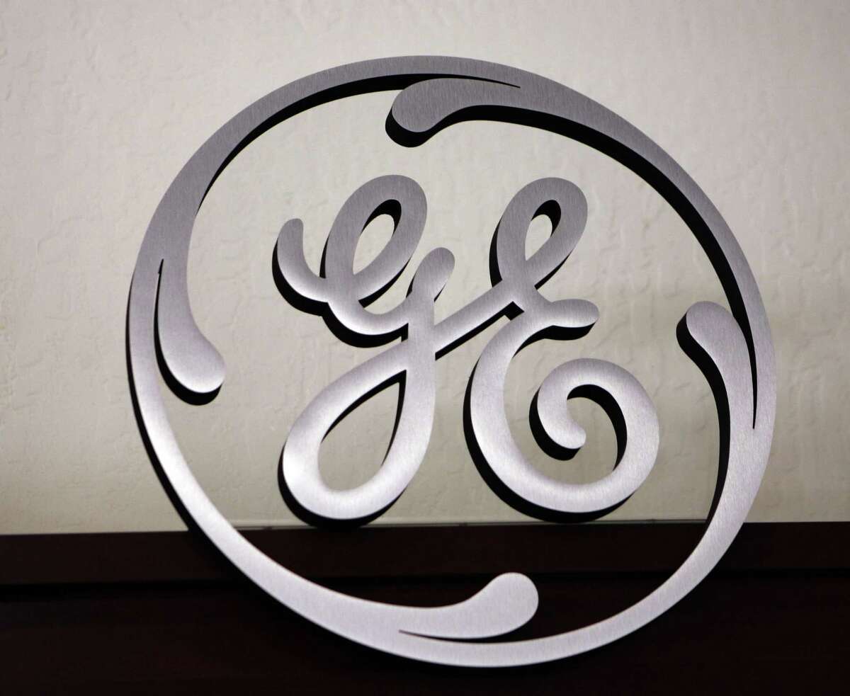 ASSOCIATED PRESS FILE PHOTO A General Electric logo on display at Western Appliance store in Mountain View, Calif.
