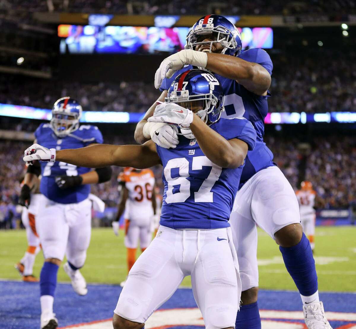 New York Giants wide receiver Sterling Shepard (87) celebrates with offensive tackle Bobby Hart (68) after scoring a touchdown against the Cincinnati Bengals during the fourth quarter in East Rutherford, N.J. Monday night.