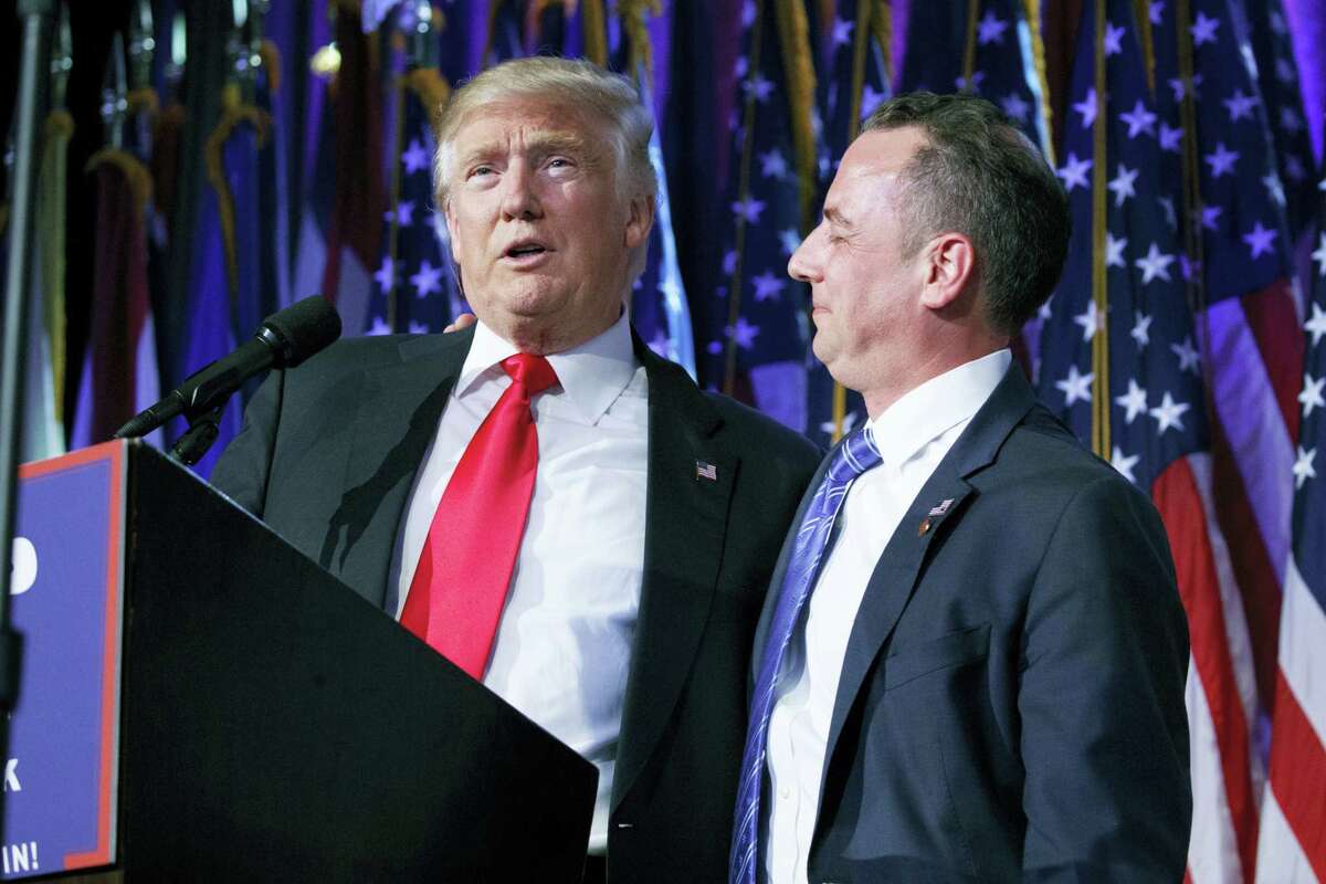 In this Nov. 9 photo, President-elect Donald Trump, left, stands with Republican National Committee Chairman Reince Priebus during an election night rally in New York.