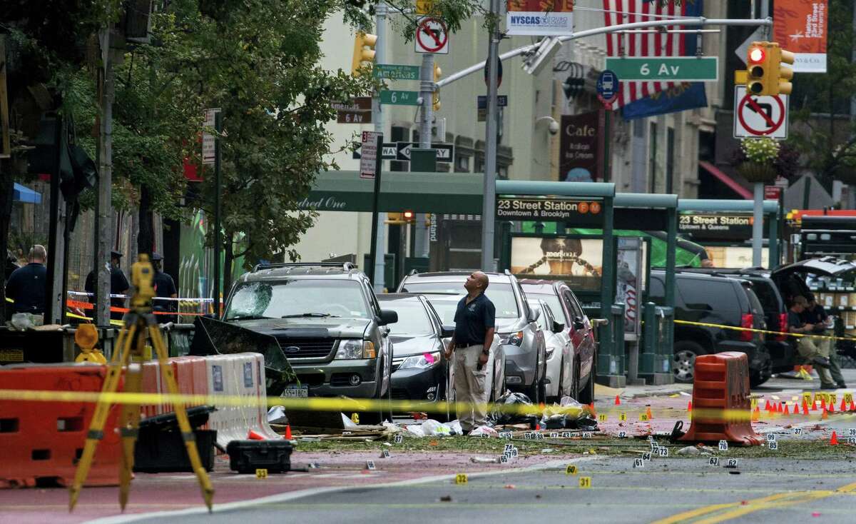 Crime scene investigators work at the scene of Saturday’s explosion in Manhattan’s Chelsea neighborhood in New York on Sept. 18, 2016.