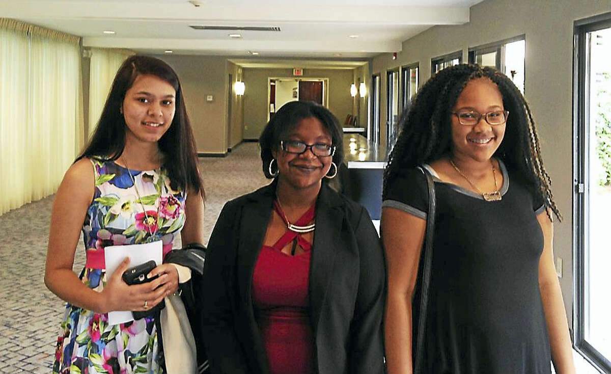 From left are Middletown High School 10th-graders Archies Marahatta and Montianna Scharborough, and ninth-grader Razahnae Watson. All took part in the Wesleyan University Upward Bound program in Middletown.