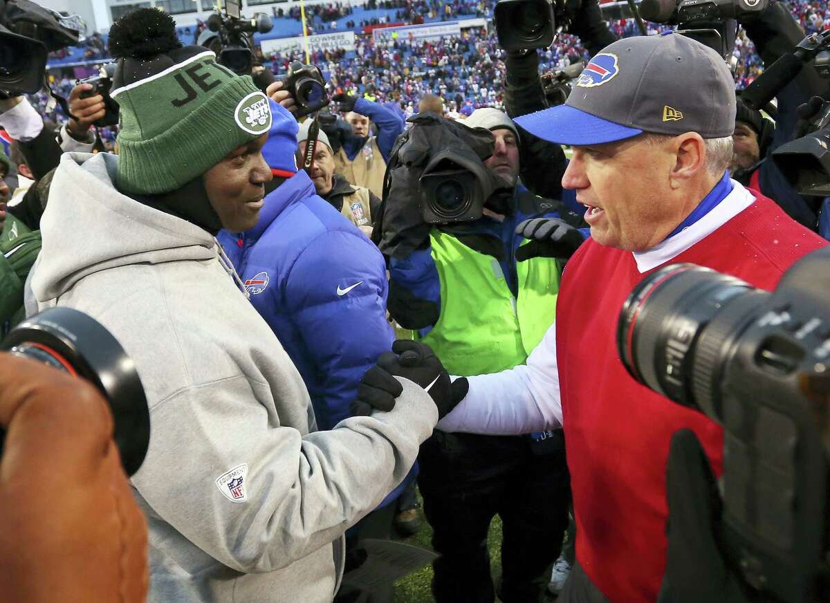 In this Jan. 3, photo, New York Jets head coach Todd Bowles, left, and Buffalo Bills head coach Rex Ryan, right, shake hands after the Bills’ 22-17 win in an NFL football game in Orchard Park, N.Y. The Jets are heading to Orchard Park for an AFC East showdown against the Bills on Thursday night.