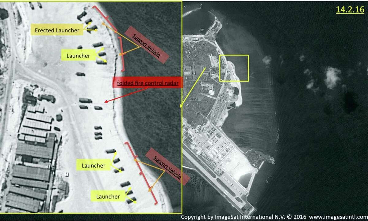 This image with notations provided by ImageSat International N.V., on Wednesday, Feb. 17, 2016, shows satellite images of Woody Island, the largest of the Paracel Islands, in the South China Sea. A tribunal ruled in a sweeping decision Tuesday, July 12, 2016, that China has no legal basis for claiming much of the South China Sea and had aggravated the seething regional dispute with its large-scale land reclamation and construction of artificial islands that destroyed coral reefs and the natural condition of the disputed areas.