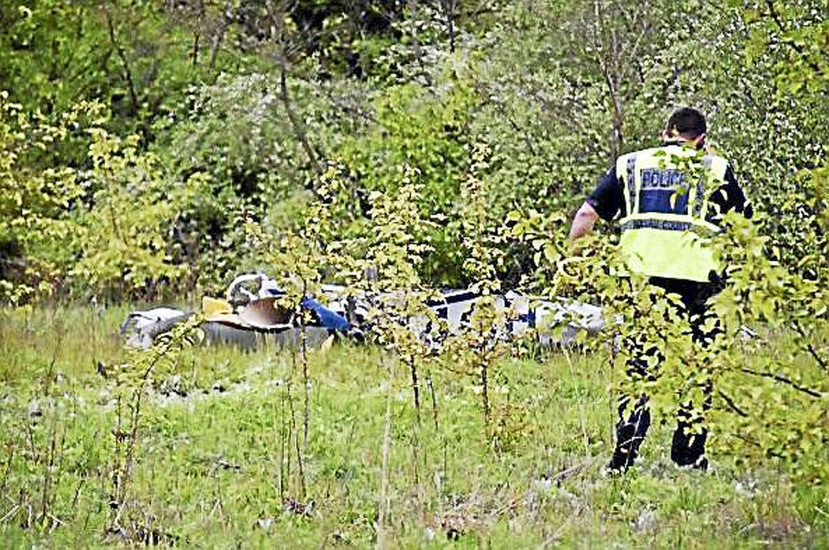 Screenshot via newsday.com: A preliminary report on the in-flight breakup of a single-engine plane that killed three people on May 3, 2016 was released by the National Transportation Safety Board on Tuesday. (Credit: Kevin Imm)