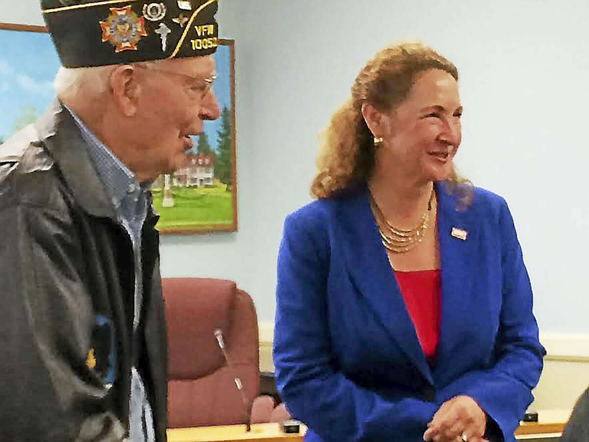 World War II veteran Irvin Daubert and U.S. Rep. Elizabeth Esty in this April file photo, after she presented the Cheshire resident with medals he had earned for his service, but never received.