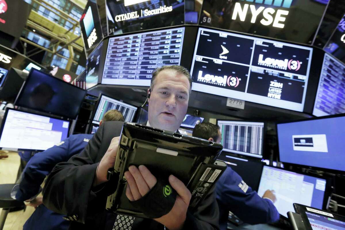 Trader Jonathan Corpina works on the floor of the New York Stock Exchange Tuesday.