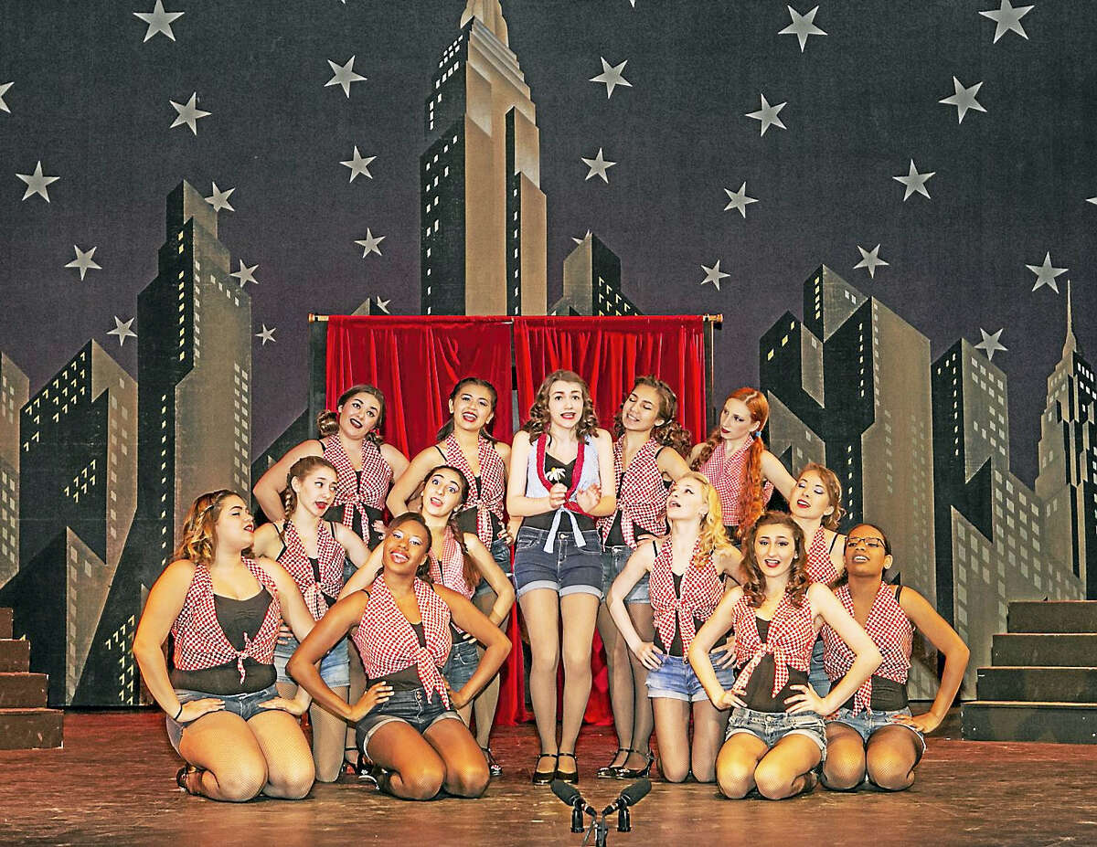 Sandy Aldieri — Special to The Press Tiffany Berry (Adelaide) and her Hot Box Girls sing “Bushel and a Peck” during dress rehearsal for Middletown High School’s production of “Guys and Dolls,” which begins its run this evening.