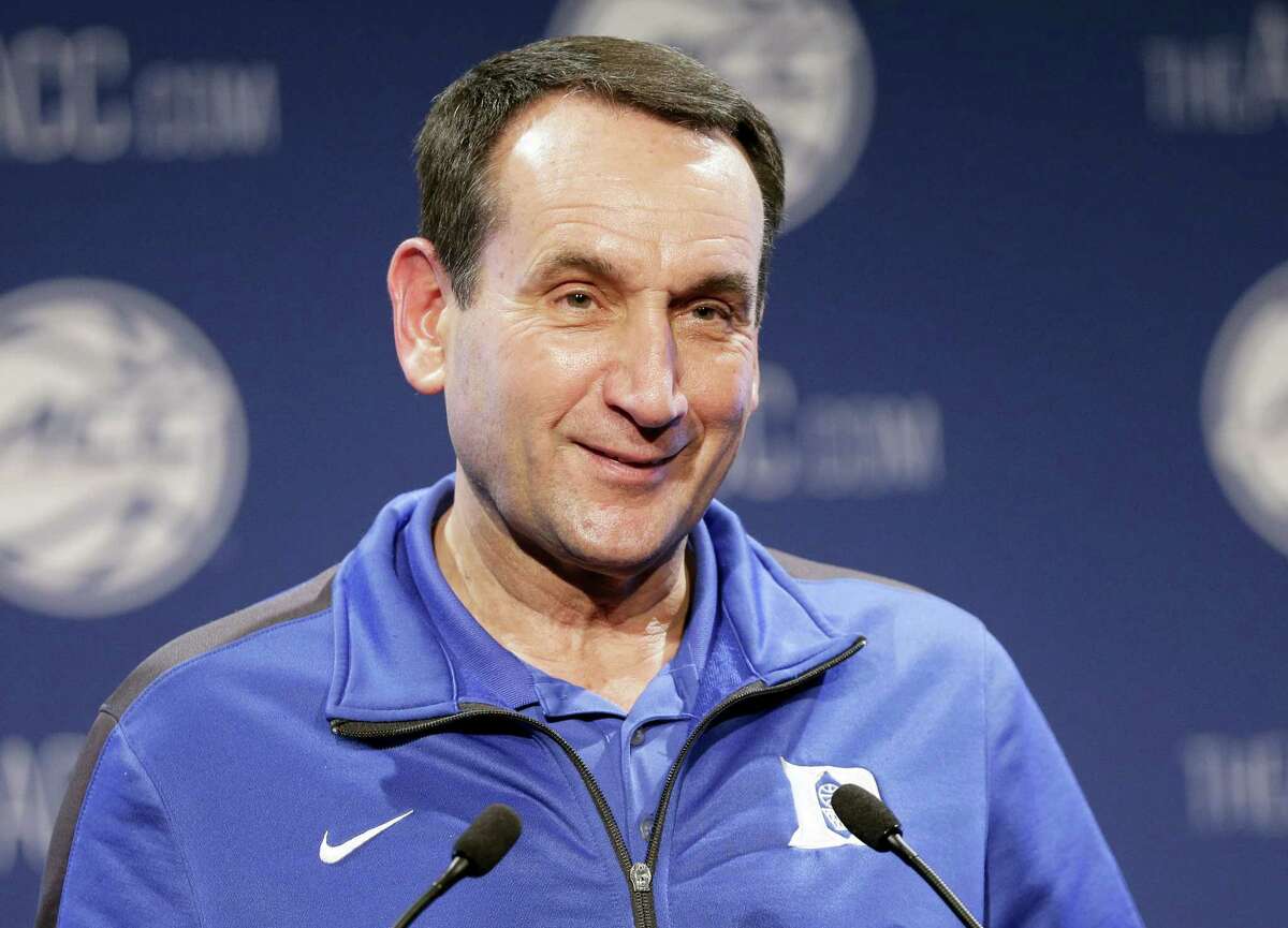 In this Oct. 28, 2015 photo, Duke NCAA college basketball coach Mike Krzyzewski answers a question during the Atlantic Coast Conference men’s media day in Charlotte, N.C.