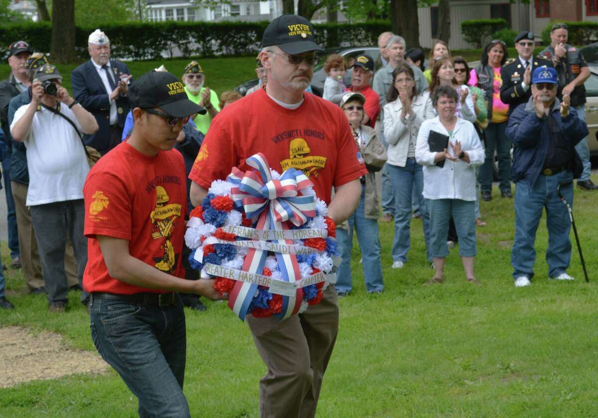 The city approved the installation of a Disabled American Veterans monument at the Veterans Memorial Green in Middletown. Here, veterans place a wreath during the 5-War Memorial dedication in 2014.
