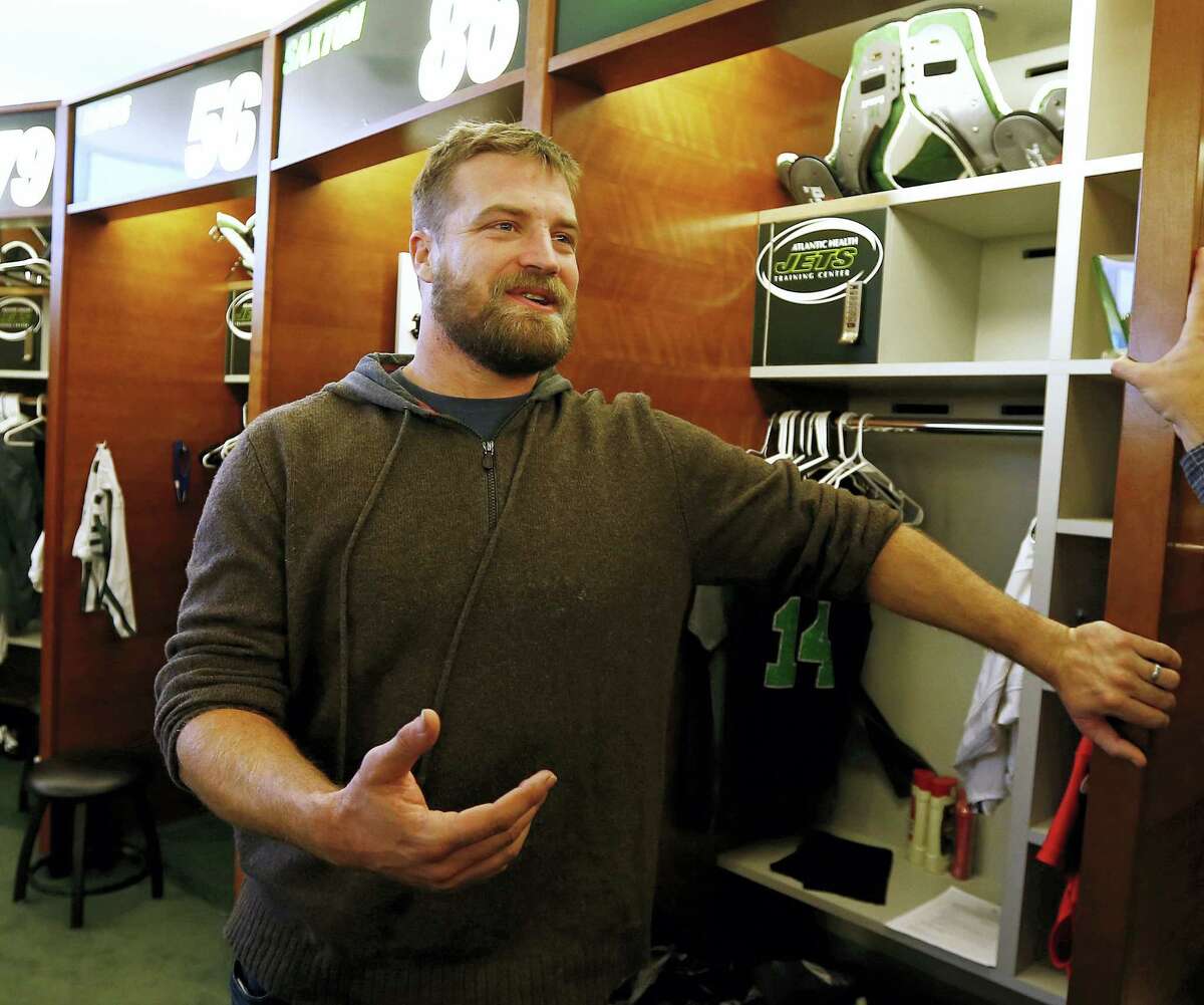 Jets quarterback Ryan Fitzpatrick talks to the media Monday in Florham Park, N.J.
