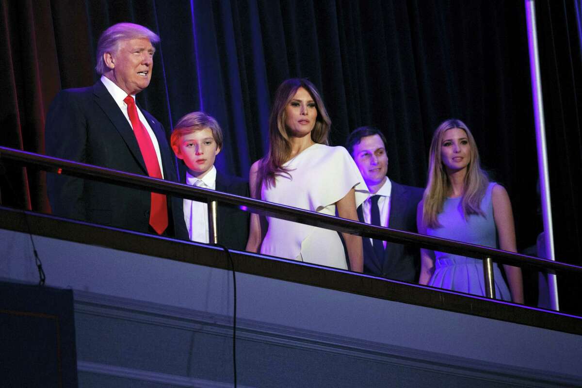 President-elect Donald Trump, left, arrives to speak at an election night rally, Wednesday, Nov. 9, 2016, in New York. From left, Trump, his son Barron, wife Melania, Jared Kushner, and Ivanka Trump.