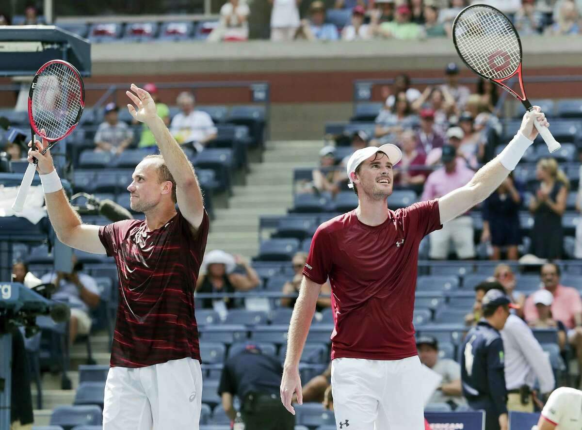 Bruno Soares, of Brazil, left, and Jamie Murray, of the United Kingdom, celebrate after winning the men’s doubles final of the U.S. Open tennis tournament on Sept. 10, 2016 in New York.
