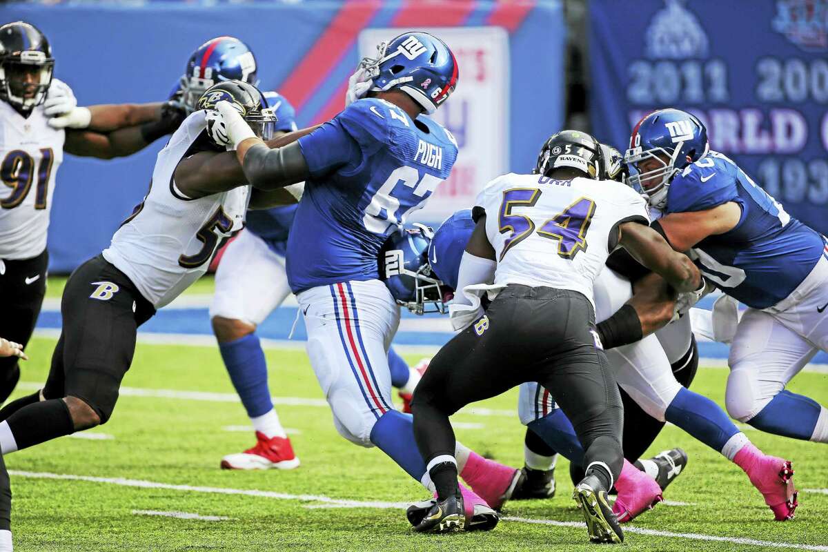 New York Giants offensive guard Justin Pugh (67) blocks during a recent game.