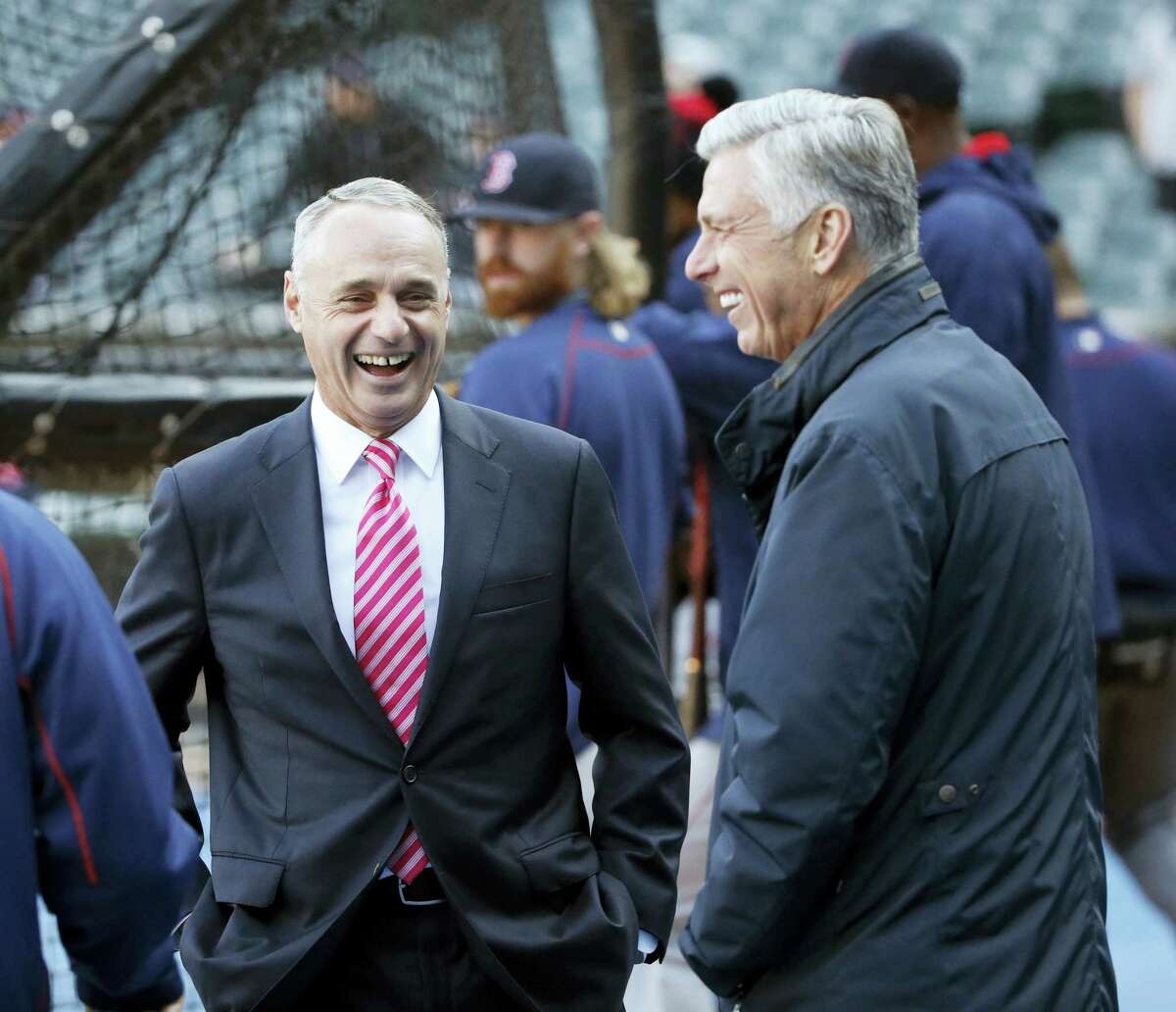 Major League Baseball commissioner Rob Manfred, left, said recently that expansion was in baseball’s future. Register columnist Chip Malafronte likes the idea so much, he came up with his own 32-team realignment.