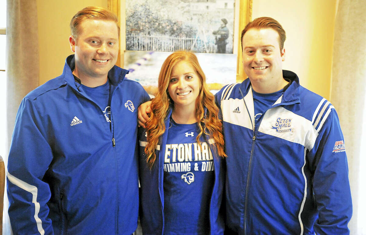 Jimmy Zanor - The Middletown PressMiddletown's Naumann family, from left, Tyler, Erica, and Nick, have been part of the Division I swimming program at Seton Hall University for 10 straight years.