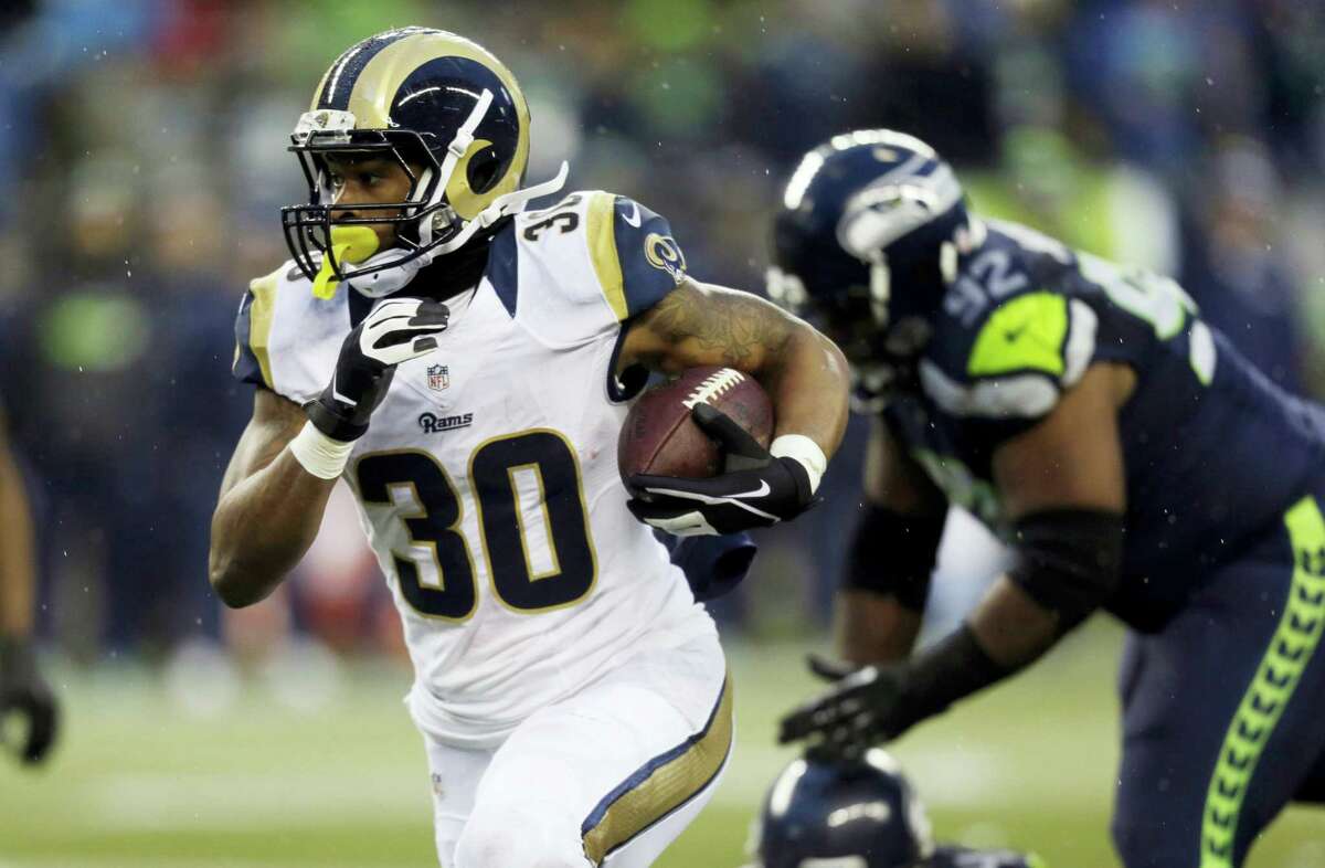 Rams running back Todd Gurley takes off against the Seahawks on Sunday in Seattle.