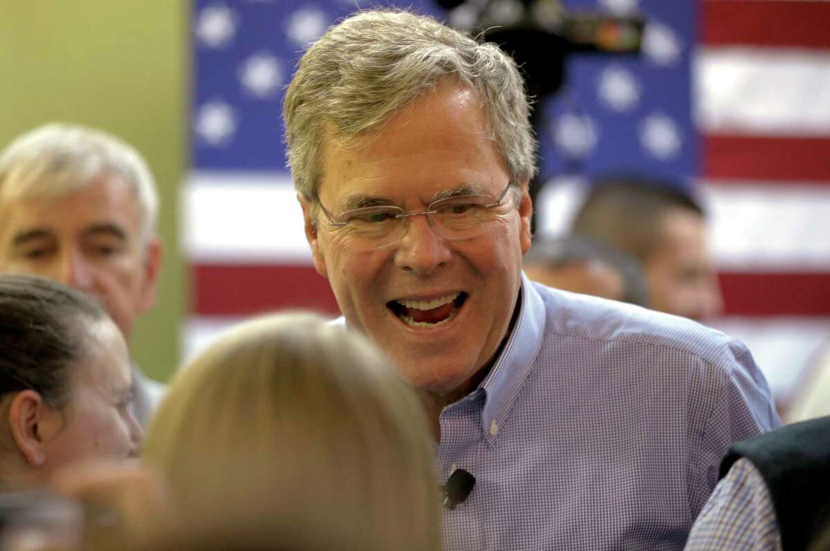 Jeb Bush greets the crowd after a campaign event at the Jeb 2016 field office Jan. 31 in Hiawatha, Iowa.
