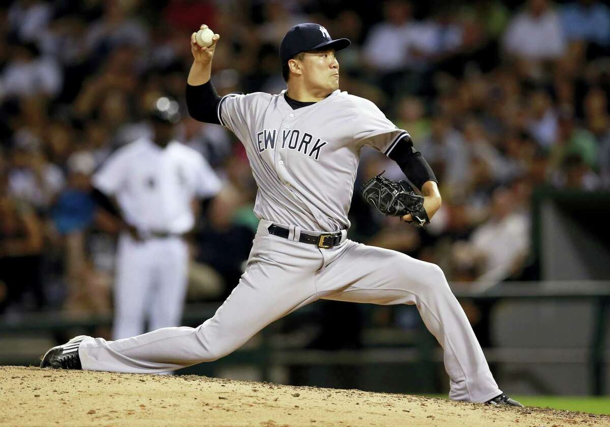 New York Yankees pitcher Masahiro Tanaka delivers during the seventh inning of a baseball game against the Chicago White Sox in Chicago, Tuesday, July 5, 2016. (AP Photo/Jeff Haynes)