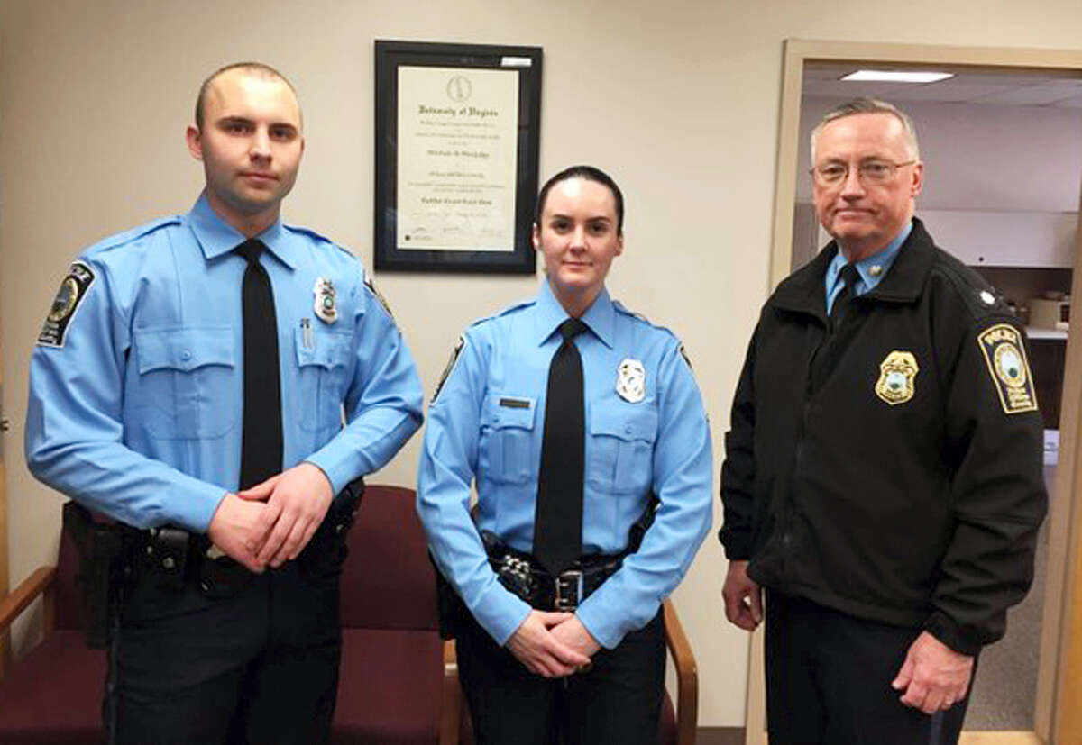 Prince William County Police Department via AP A photo provided by the Prince William County Police Department shows, from the left, Officer Steven Kendall, Officer and Ashley Guindon with Lt. Col. Barry Bernard, deputy chief of the Prince William County, Va., Police Department. Officer Ashley Guindon was shot and killed on Feb. 28, 2016 and two of her colleagues were wounded in a confrontation stemming from a call about an argument. Guindon and Kendall were sworn in on Friday, and Guindon was working her first shift with the Prince William County Police Department when she was killed.