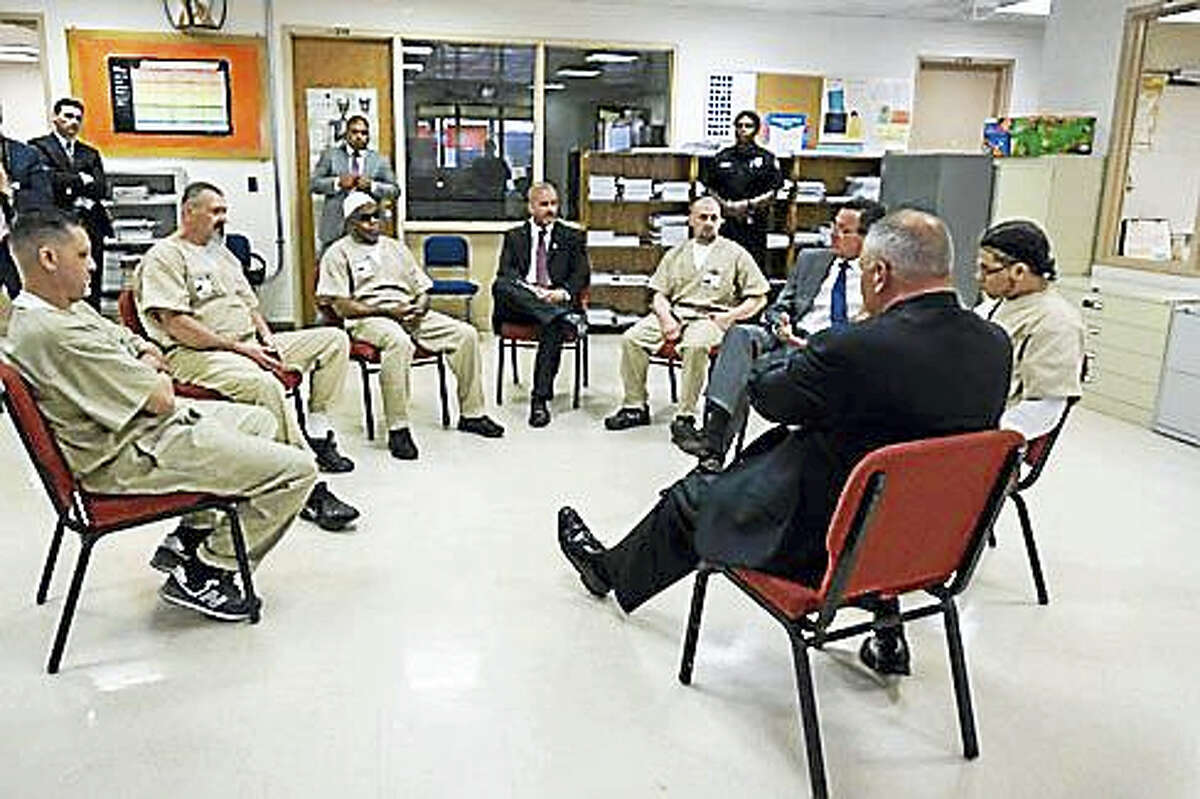 Gov. Dannel P. Malloy and Corrections Commissioner Scott Semple talk to inmates in May.